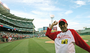 Body Glove Founder Bob Meistrell prepares to throw the first pitch at Anaheim Angels game